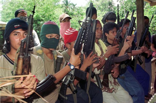 Abu Sayyaf gunmen displaying their weapons in the jungles of the Philippines in 2000. Photo: AFP